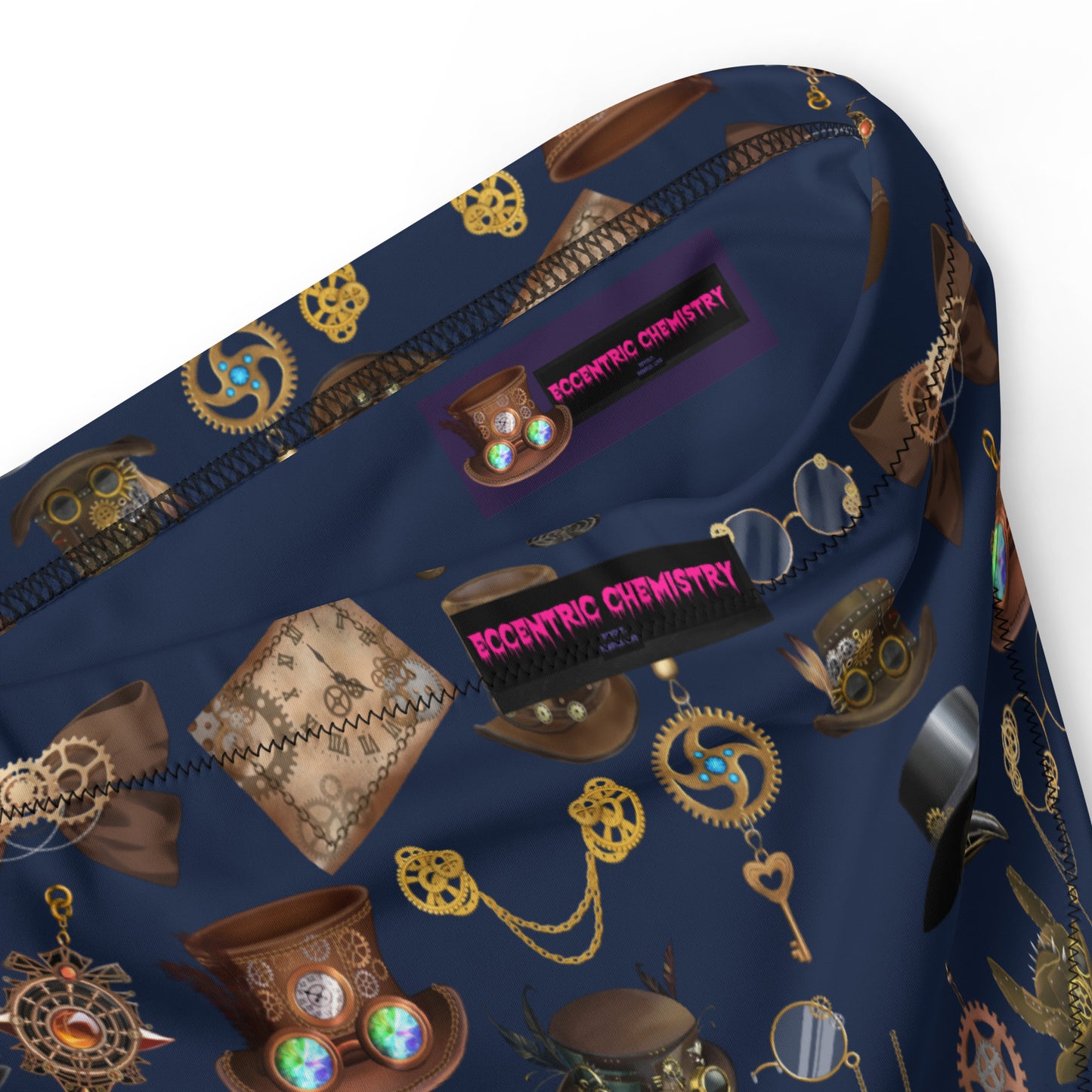 Women’s high-waisted bikini bottom with all-over recycled print, stylish design from Eccentric Chemistry’s Laboratory of Strange & Stylish Things.