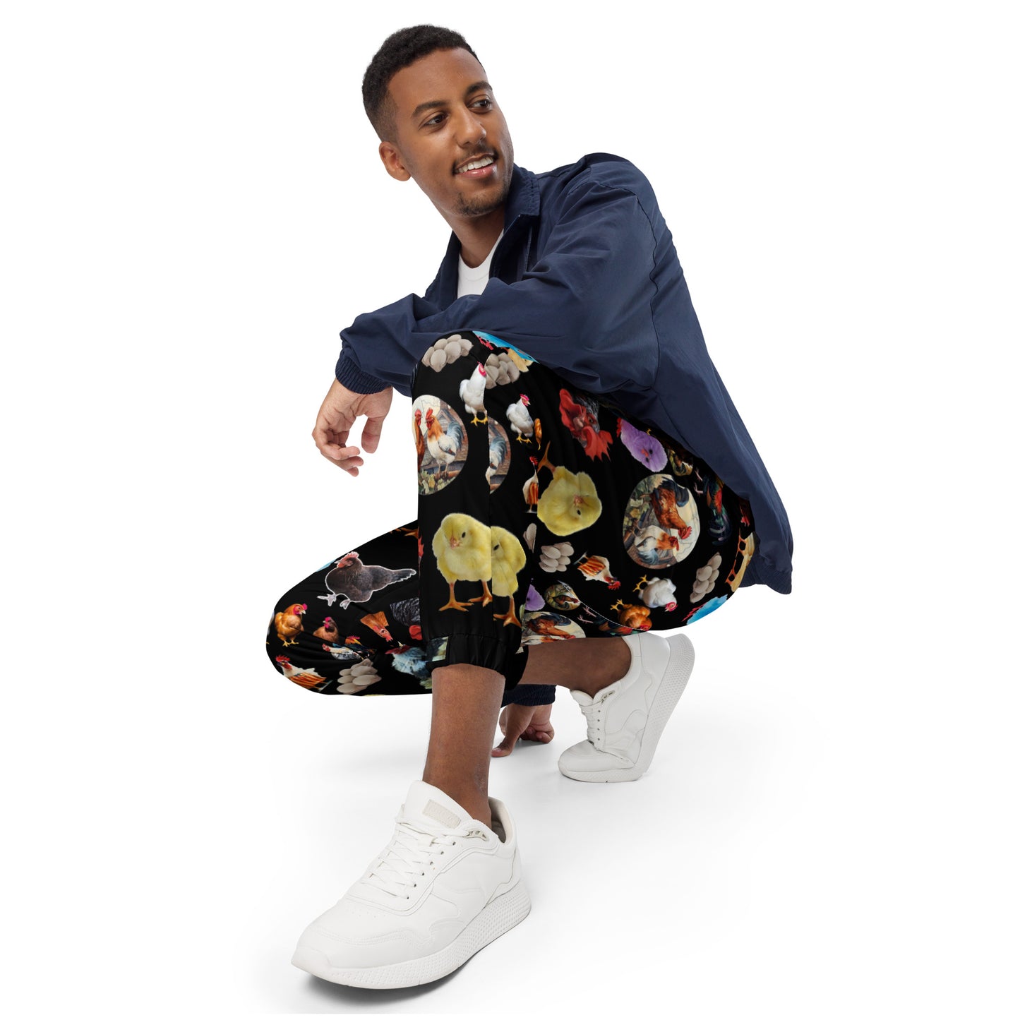 Unisex Shadow Hen Strut Experiment track pants by Eccentric Chemistry with all-over white print and casual fit.