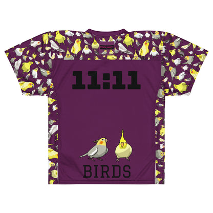 White American football jersey with all-over print featuring bold feather and experiment graphics, by Eccentric Chemistry Laboratory.