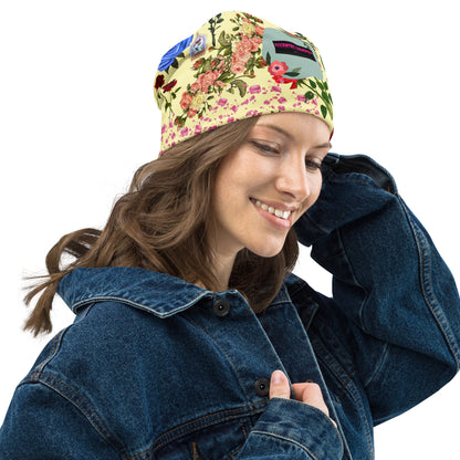 White floral print beanie from Eccentric Chemistry’s Laboratory of Strange & Stylish Things, featuring all-over floral pattern and casual style.