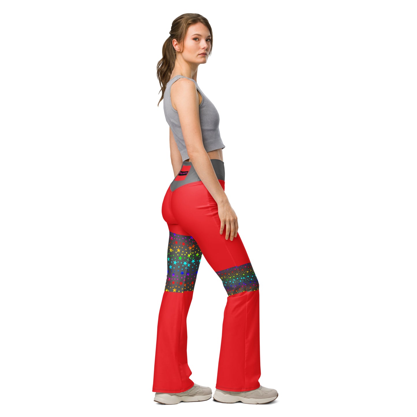 Women's flare leggings with cosmic color pop print, featuring all-over abstract patterns in vibrant hues.