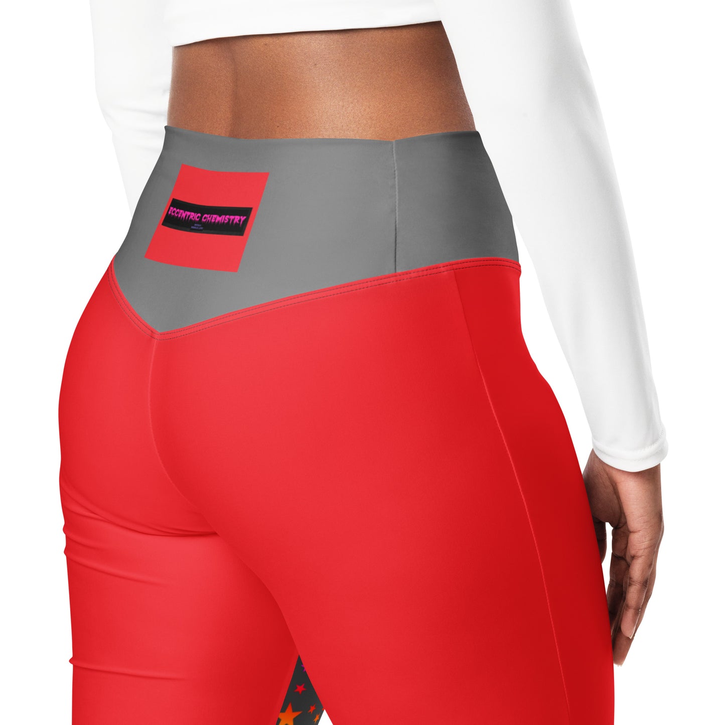 Women's flare leggings with cosmic color pop print from Eccentric Chemistry, featuring an all-over abstract pattern on white fabric.