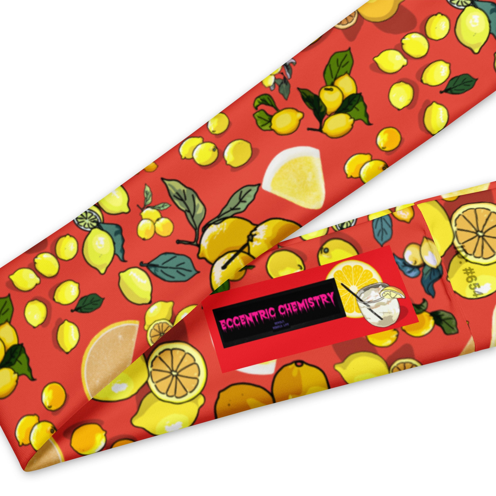 Unisex Citrus Fusion headband by Eccentric Chemistry featuring colorful all-over print on white fabric, casual and stylish accessory.