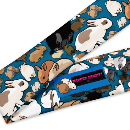 Eccentric Chemistry’s white all-over-print headband featuring playful Quantum Bunny Bounce Experiment design.