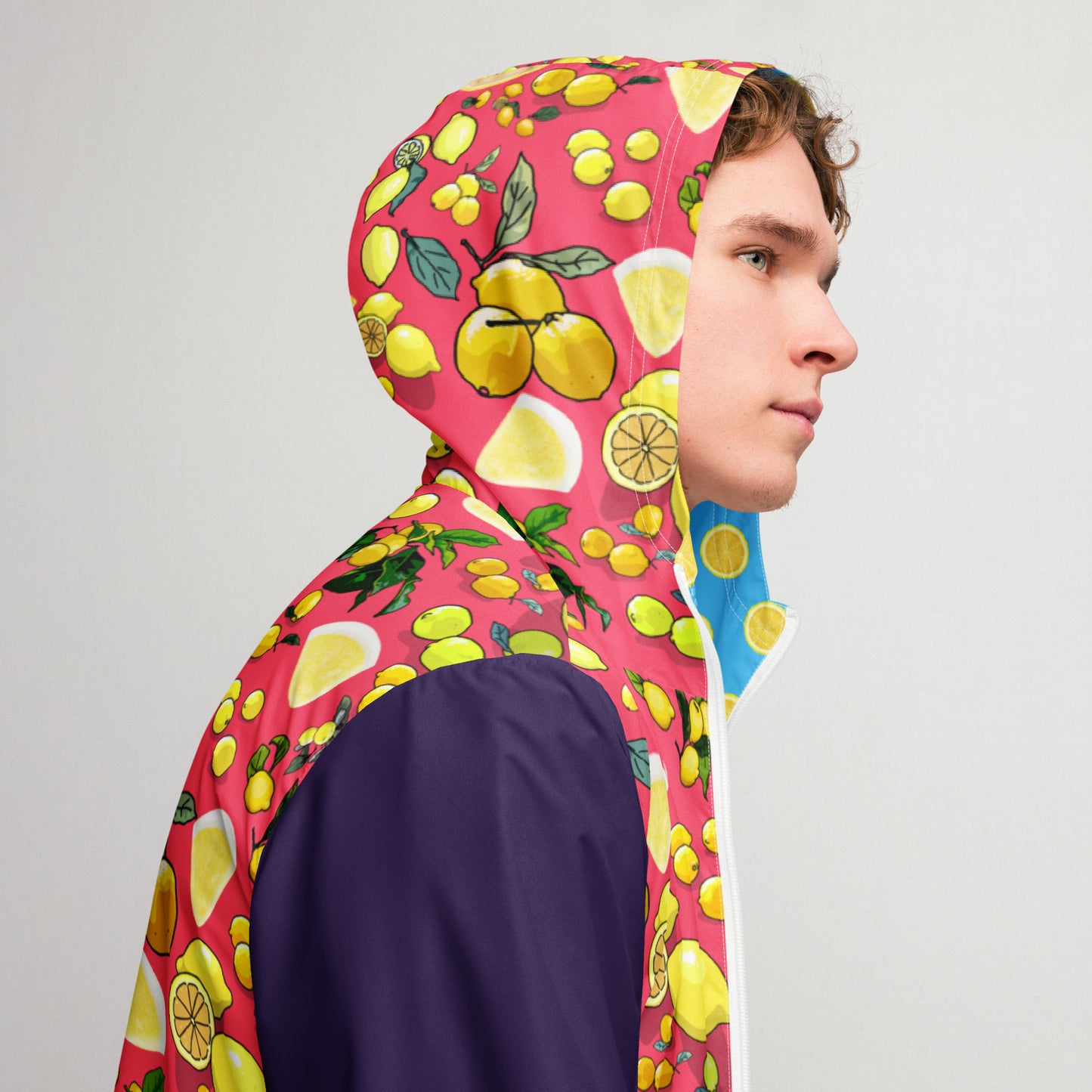 Men’s white windbreaker with all-over citrus storm print from Eccentric Chemistry’s Laboratory of Strange & Stylish Things.