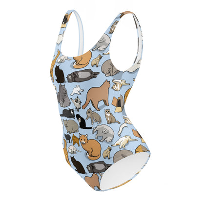 White one-piece feline swimsuit featuring an all-over print, designed for bio‑suit soul synchronization by Eccentric Chemistry.