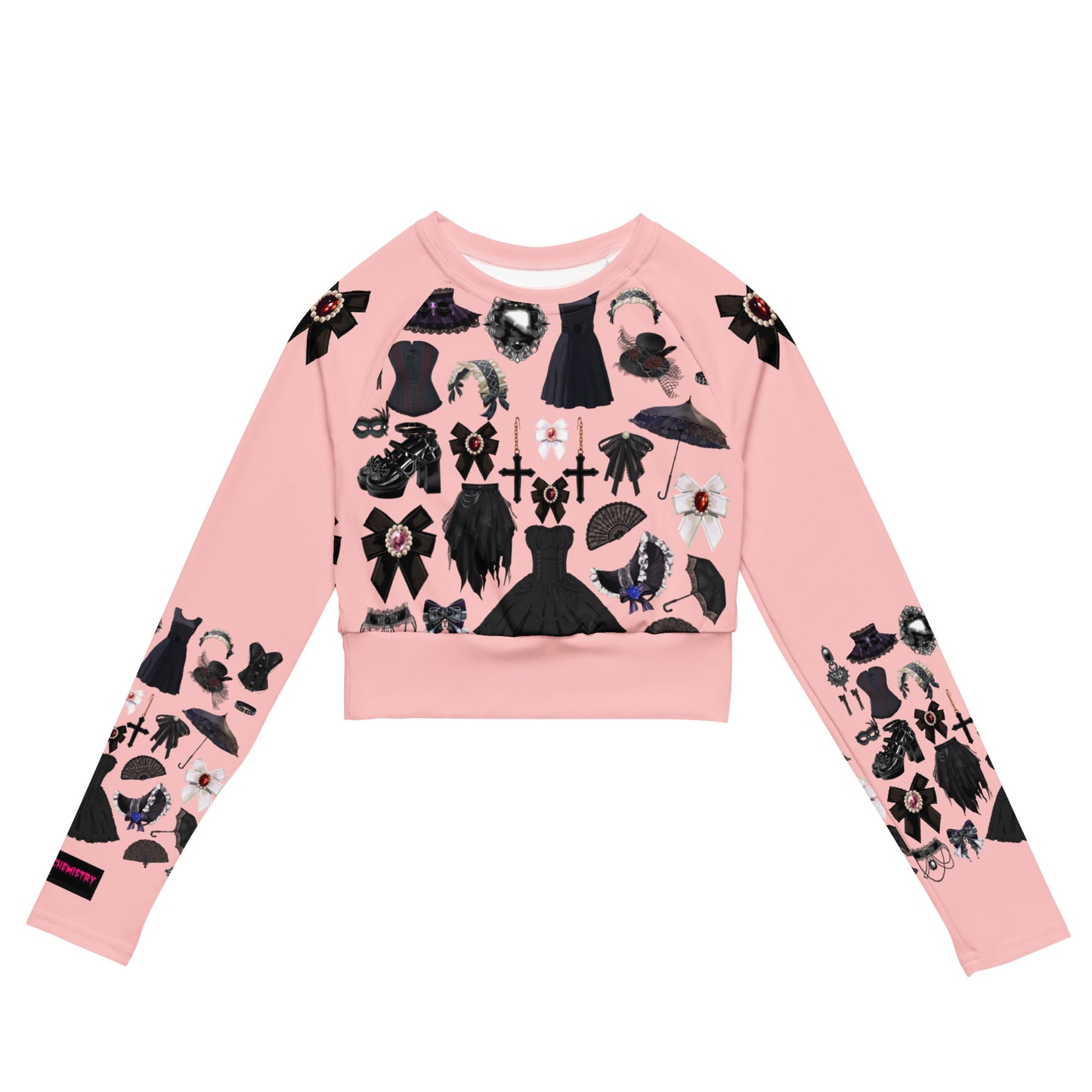 Women's pink gothic long sleeve crop top by Eccentric Chemistry, featuring all-over recycled print and trendy cut-sew design.