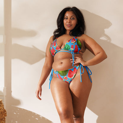 Recycled string bikini in cool melon splash print by Eccentric Chemistry, featuring all-over white print design.