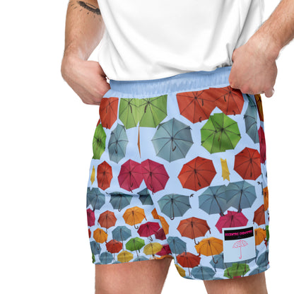 Unisex blue storm mesh shorts with all-over recycled print, featuring a stylish cut-sew design from Eccentric Chemistry’s lab.