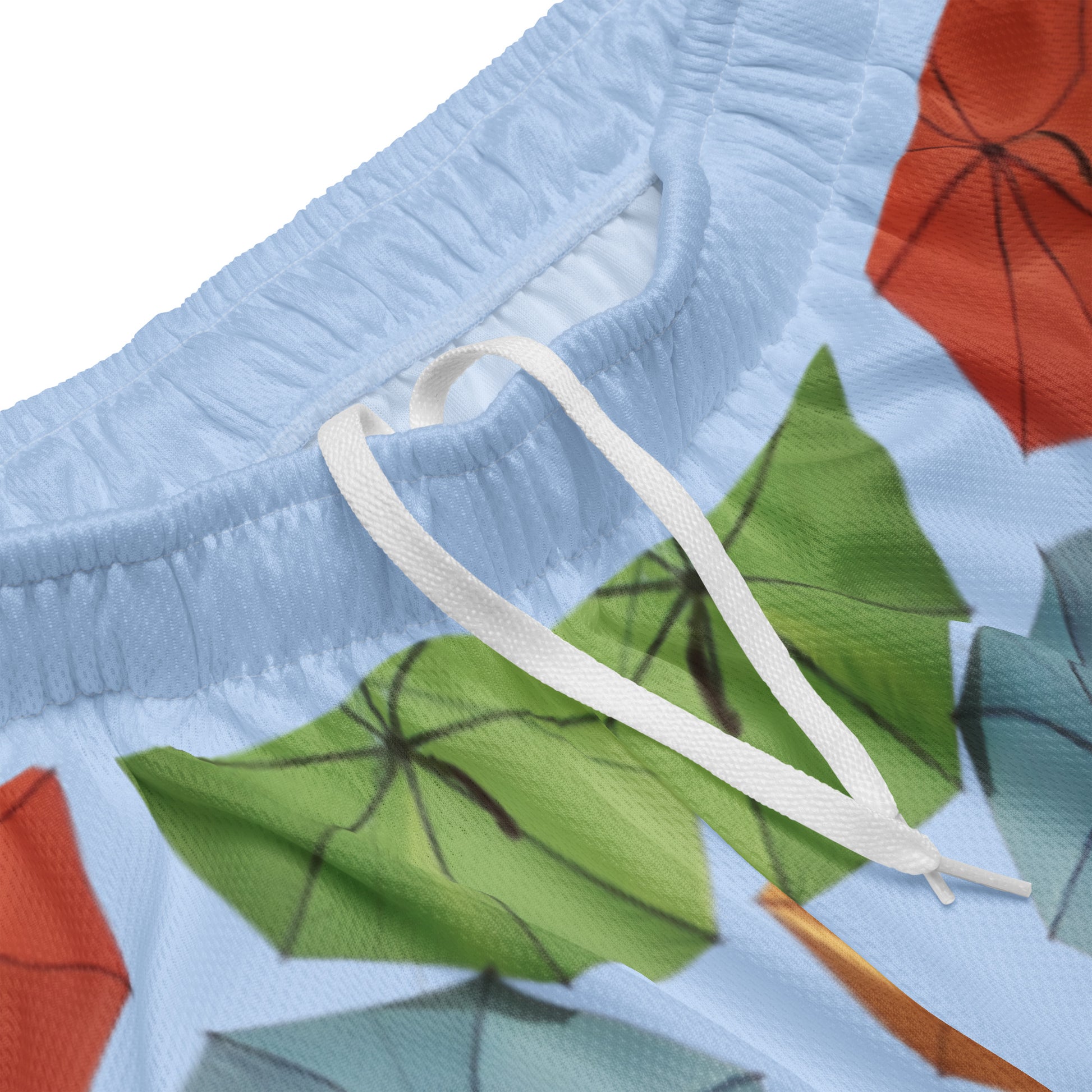 Unisex blue storm mesh shorts with all-over recycled print, featuring a stylish cut-sew design by Eccentric Chemistry.