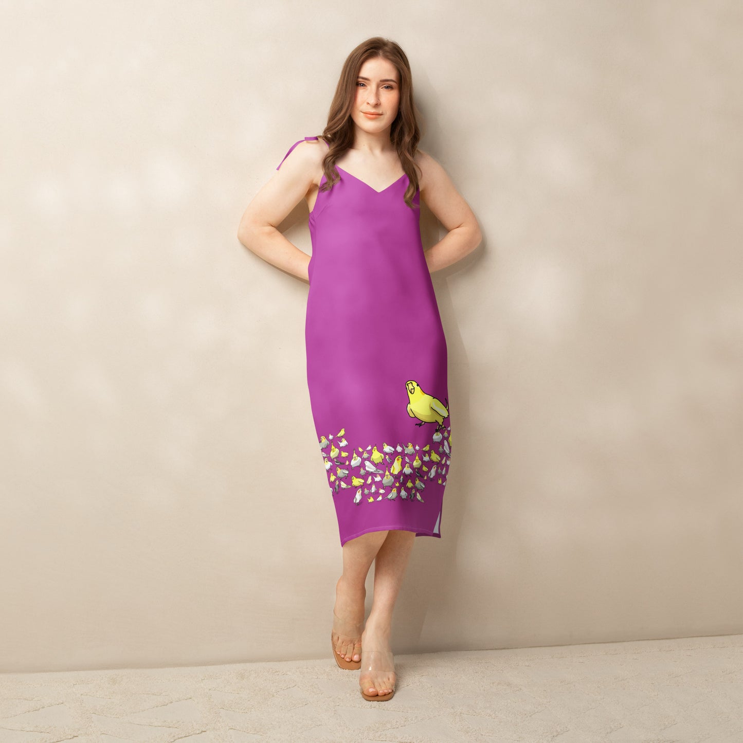 Eccentric Chemistry's white tie-strap midi dress with all-over bright bird and crest print, stylish slip dress front view.