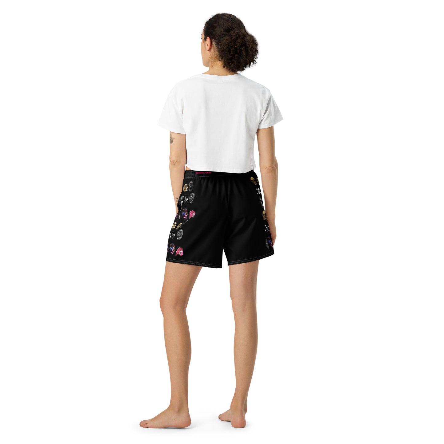 Unisex white athletic long shorts with all-over skull and impact reactor print by Eccentric Chemistry's Tiny Shop of T-Shirt Horrors