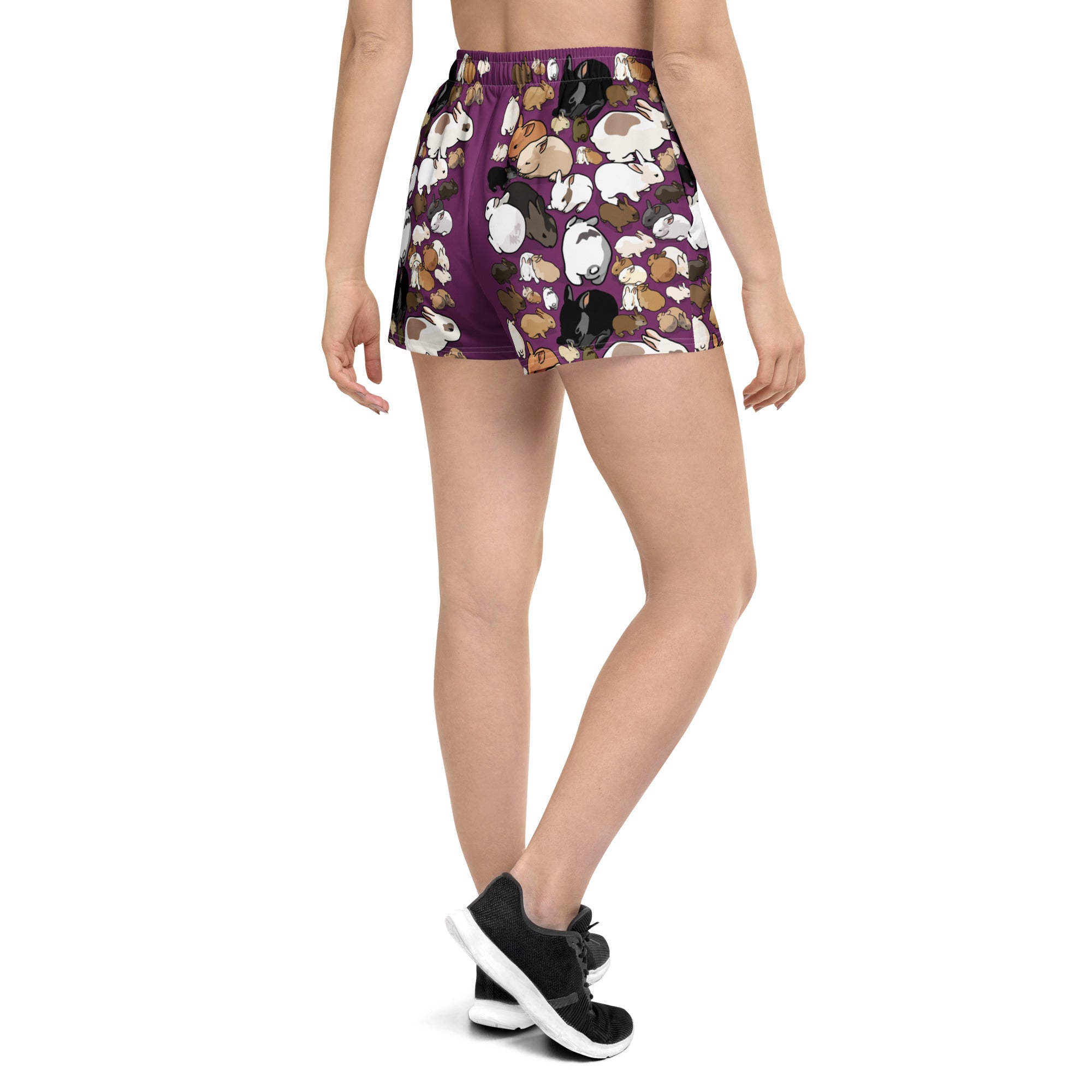 Unisex athletic shorts with all-over bunny print, white background, made by Eccentric Chemistry's Laboratory of Strange & Stylish Things.