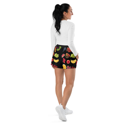 Unisex athletic shorts with all-over Juicy Fruit Fusion print by Eccentric Chemistry, showing white back view and vibrant fruit design.