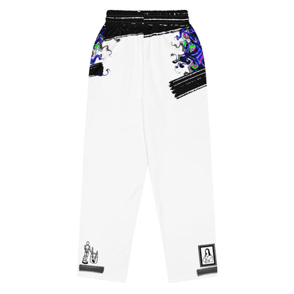 Unisex wide-leg joggers with colorful all-over print featuring creative energy diffusion patterns on white fabric.