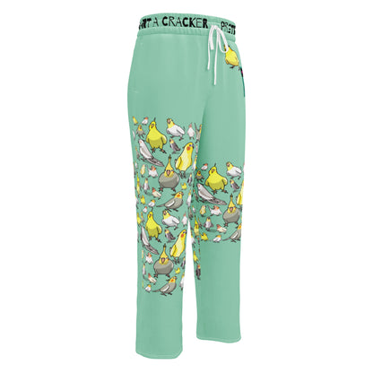 Unisex wide-leg joggers with cockatiel garden print, white all-over design, made by Eccentric Chemistry's Laboratory of Strange & Stylish Things.