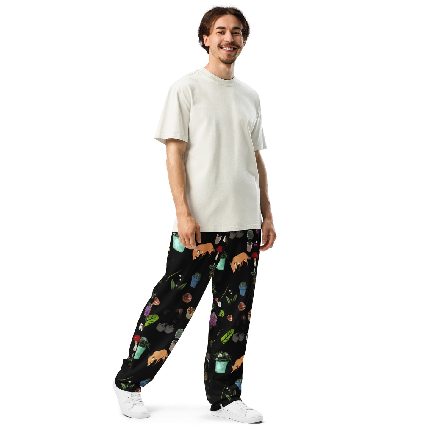 All-over print unisex wide-leg Earth‑Kind Habitat Joggers in white, featuring eco-friendly design by Eccentric Chemistry.