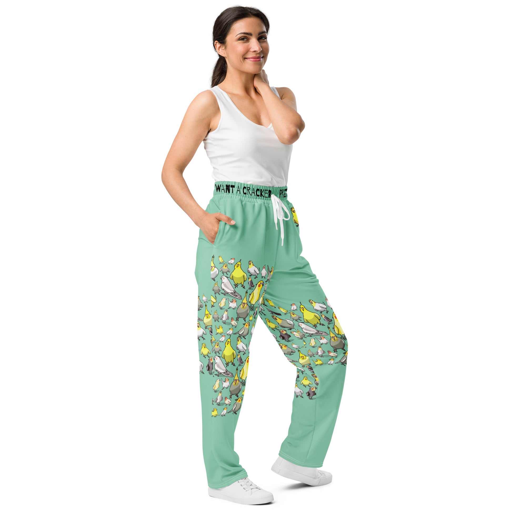 Unisex wide-leg joggers with cockatiel garden print, white all-over design, from Eccentric Chemistry’s Laboratory of Strange & Stylish Things.