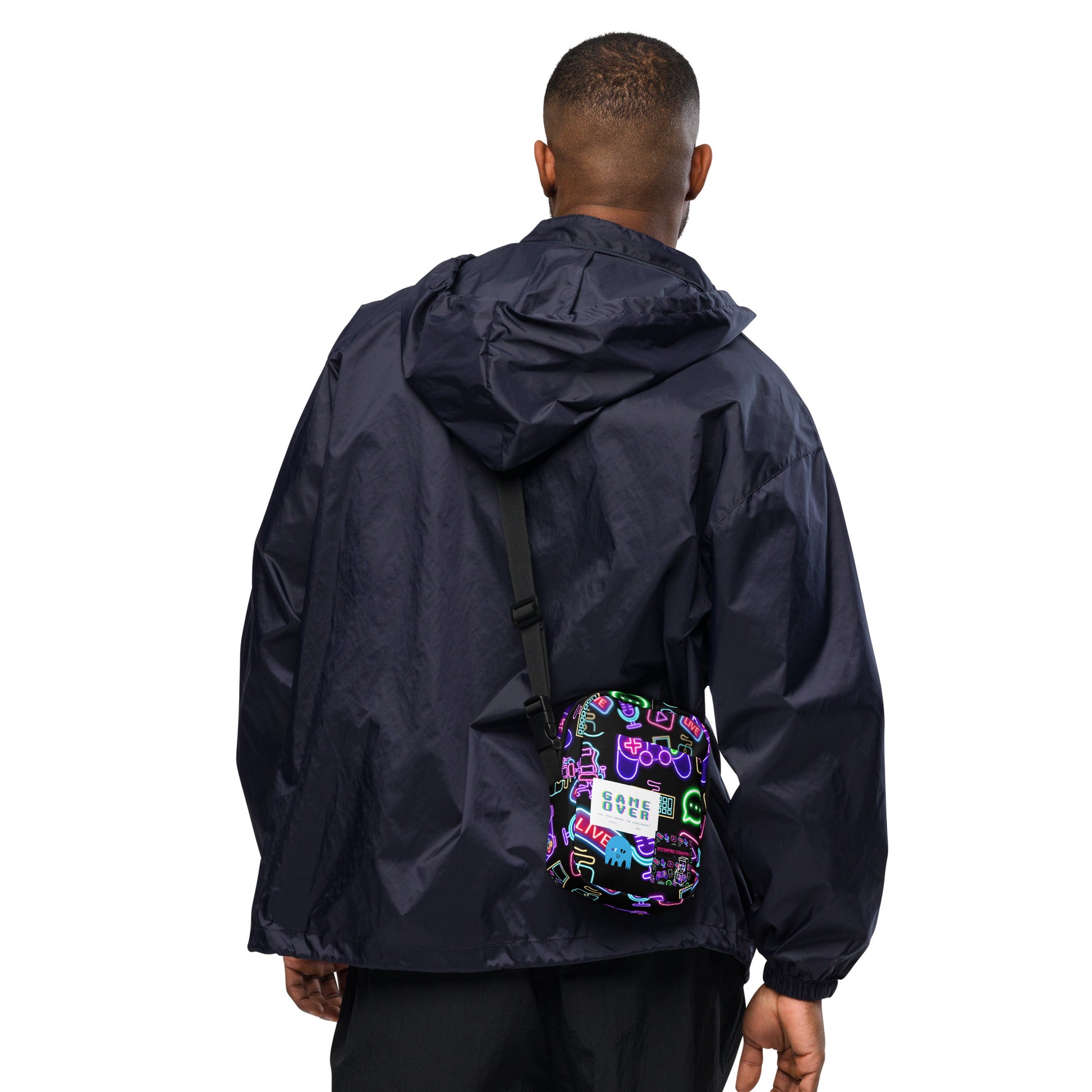 Eccentric Chemistry's Dork-Core Gaming Utility Crossbody Bag with all-over print in white, featuring functional compartments and bold design.