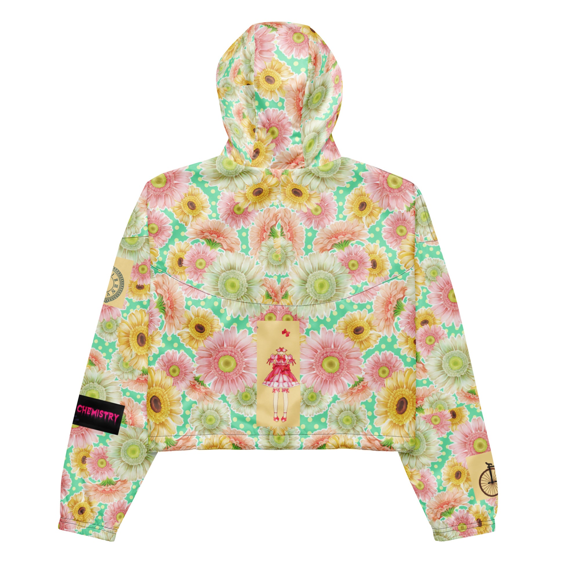 Black women's cropped windbreaker with all-over print, showcasing wind resistance under maximum bloom pressure by Eccentric Chemistry.