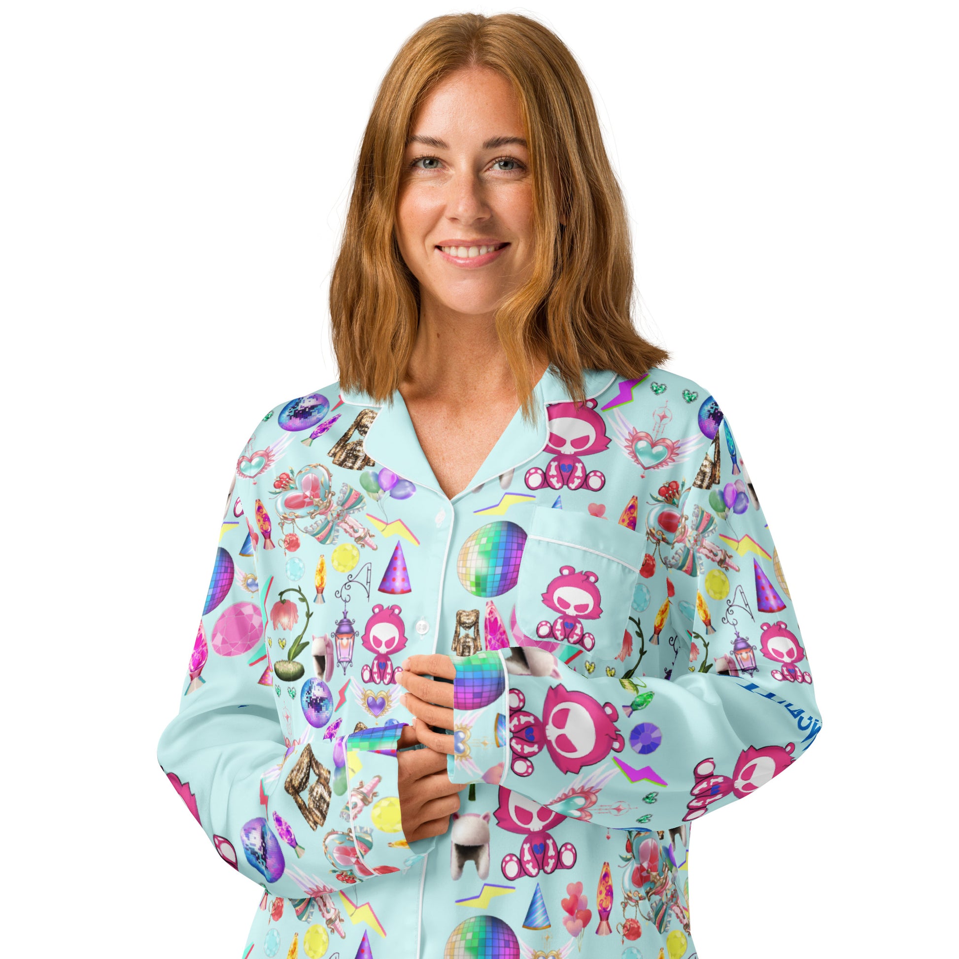 Women’s long sleeve pajama top from Eccentric Chemistry’s Snuggle Squad Sleepover collection, white with all-over print design.