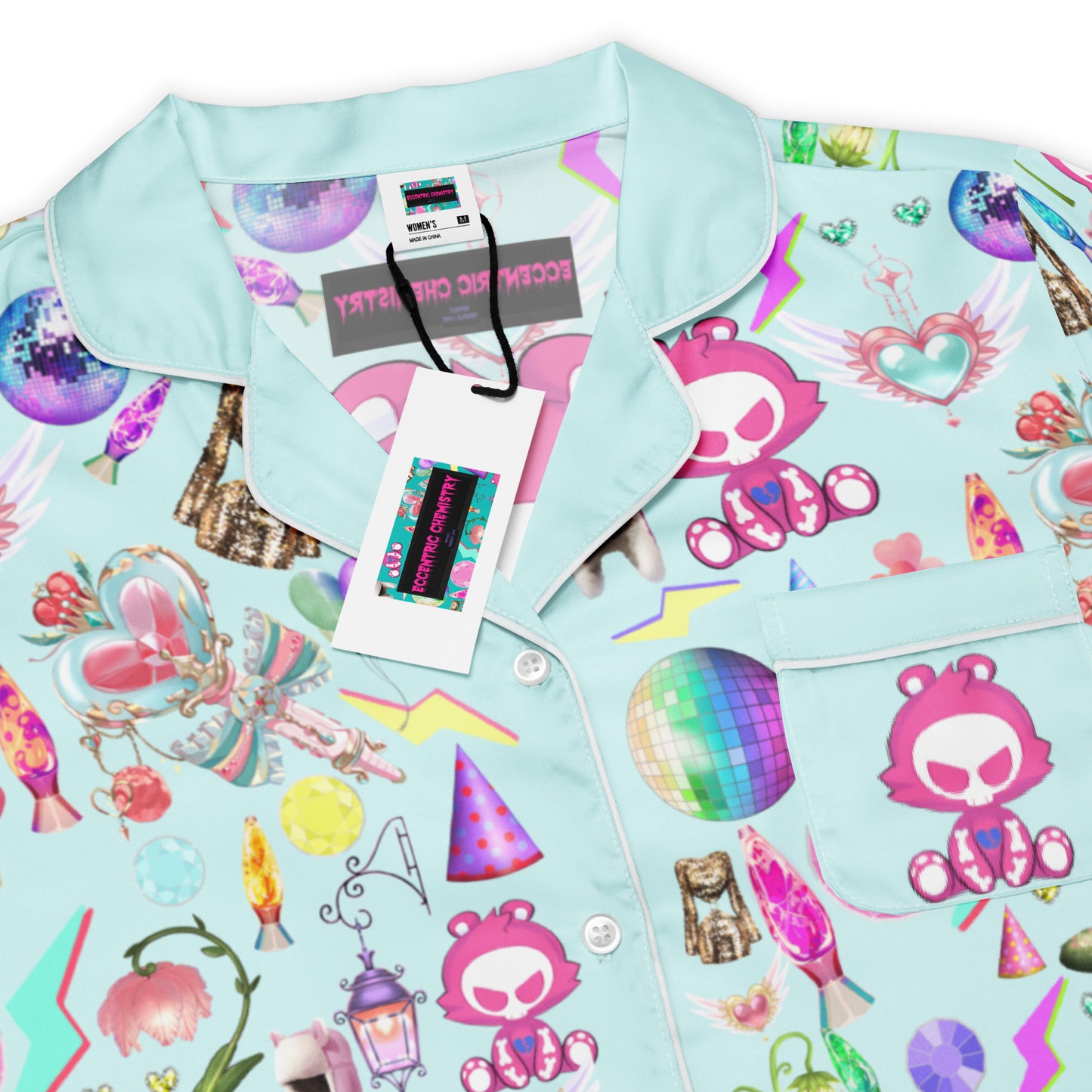 Women’s long sleeve pajama top by Eccentric Chemistry with all-over print featuring playful, scientific-inspired design.