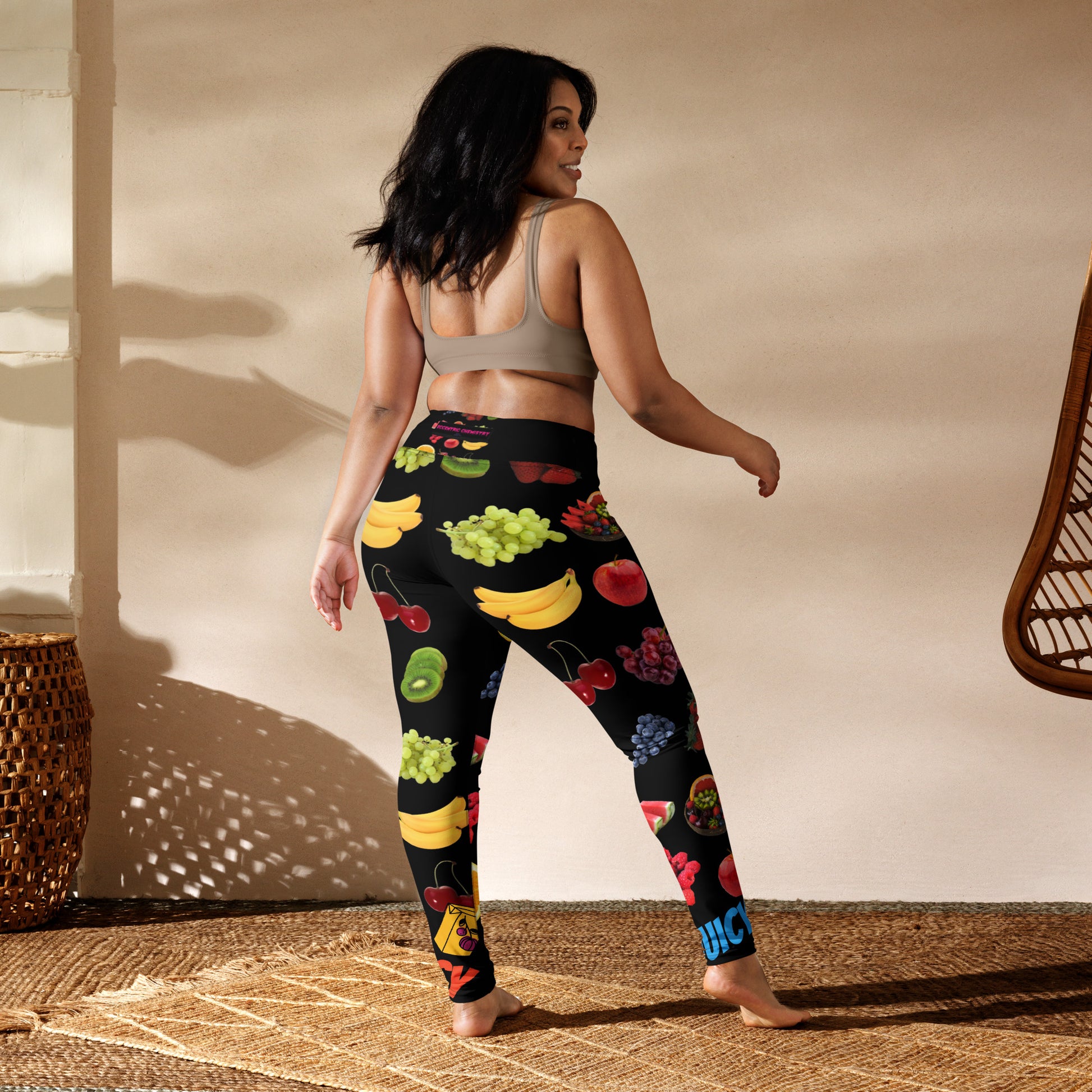 White all-over-print yoga leggings from Juicy Photon Stretch Wear by Eccentric Chemistry's Tiny Shop of T-Shirt Horrors, shown from the back.