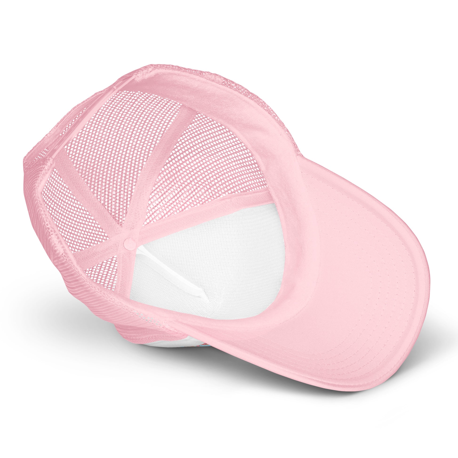 Light pink foam trucker hat with white accents featuring a playful cupcake and lamb design, casual unisex style.