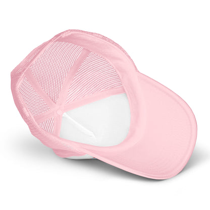 Light pink foam trucker hat with white accents featuring a playful cupcake and lamb design, casual unisex style.