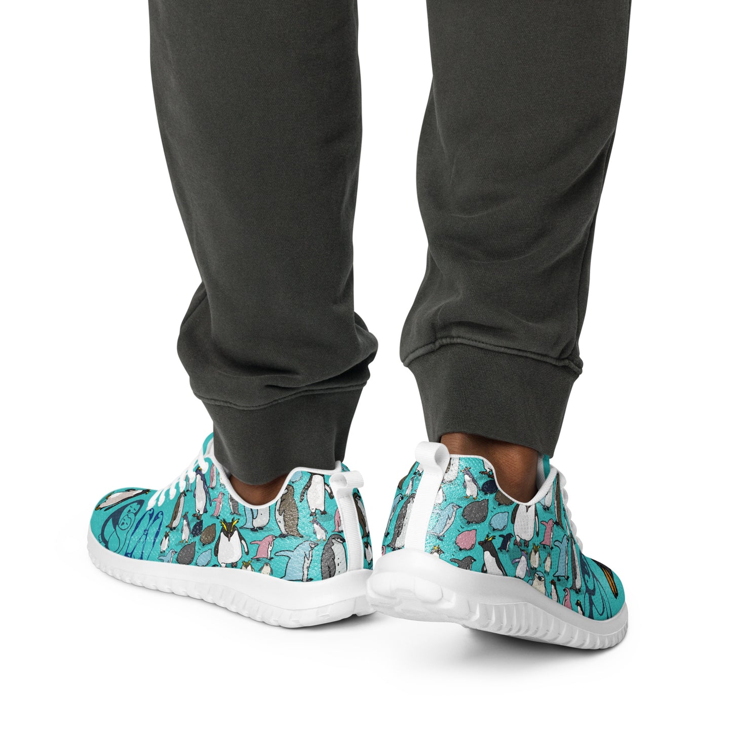 Men’s white athletic shoes from Happy Feet Penguin Experiment by Eccentric Chemistry, shown from the back view.