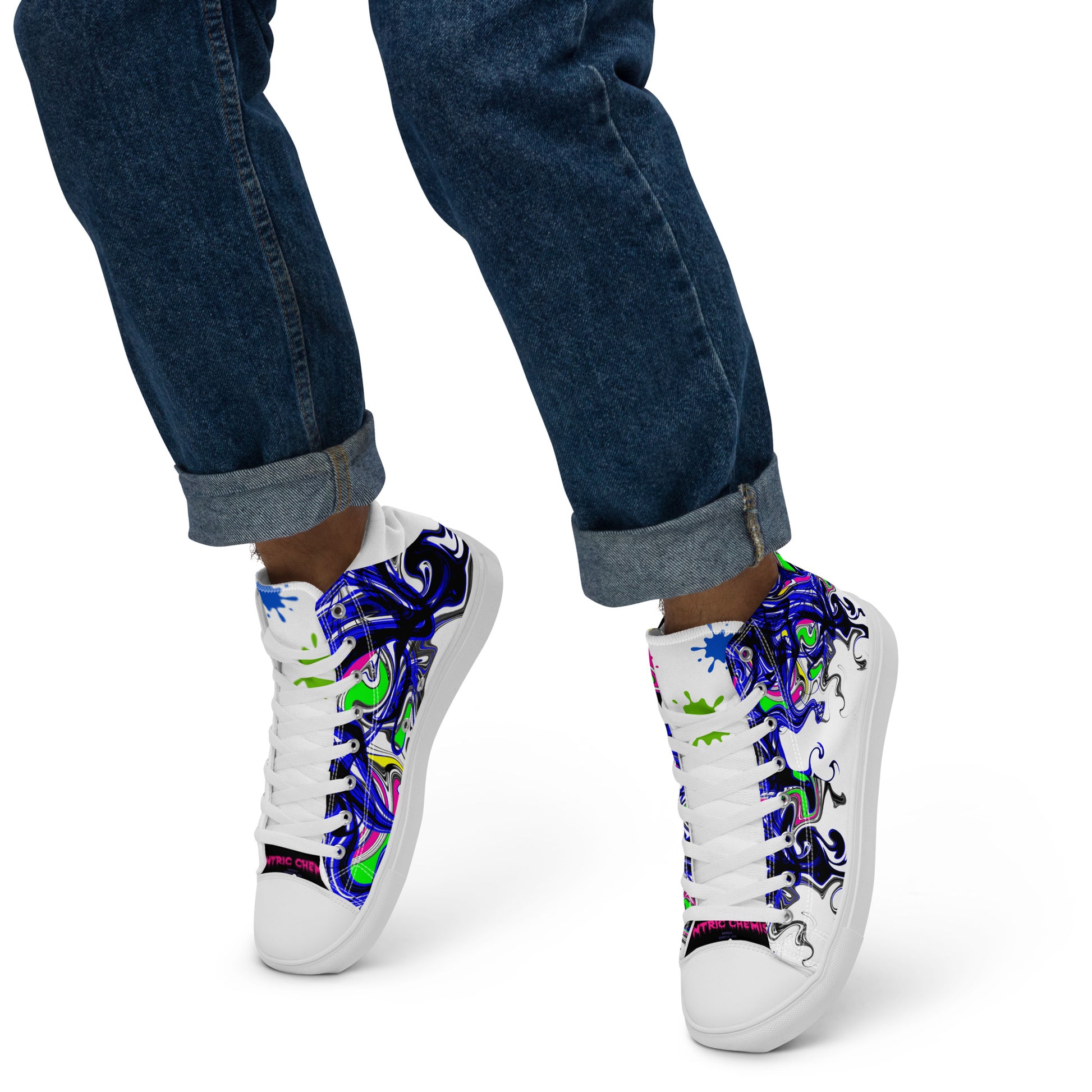 White men's high-top canvas shoes with colorful paint-splash design, styled as "Outfit Maker" kicks by Eccentric Chemistry.