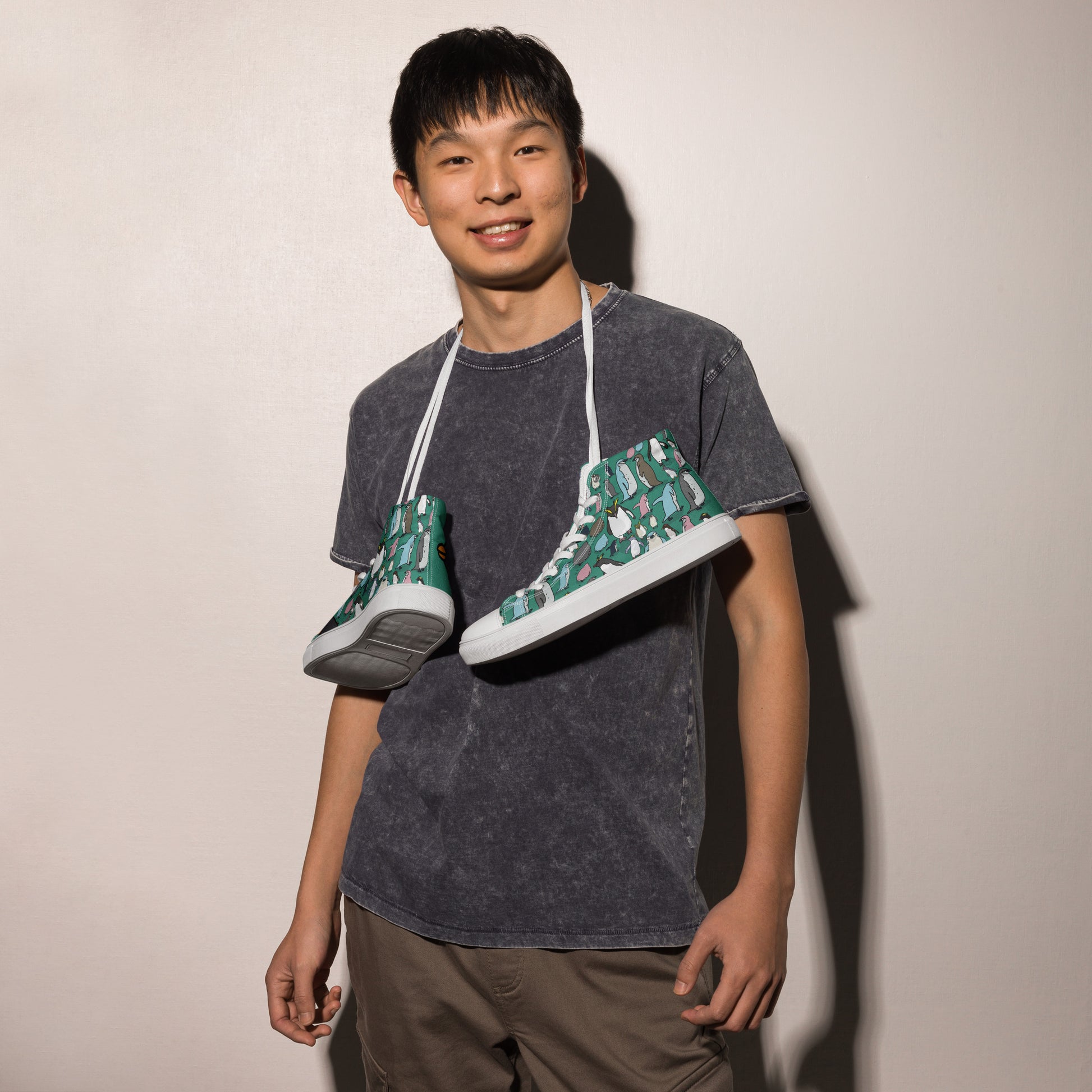 Men’s green high-top canvas shoes from Eccentric Chemistry’s Laboratory of Strange & Stylish Things, shown from the left side.