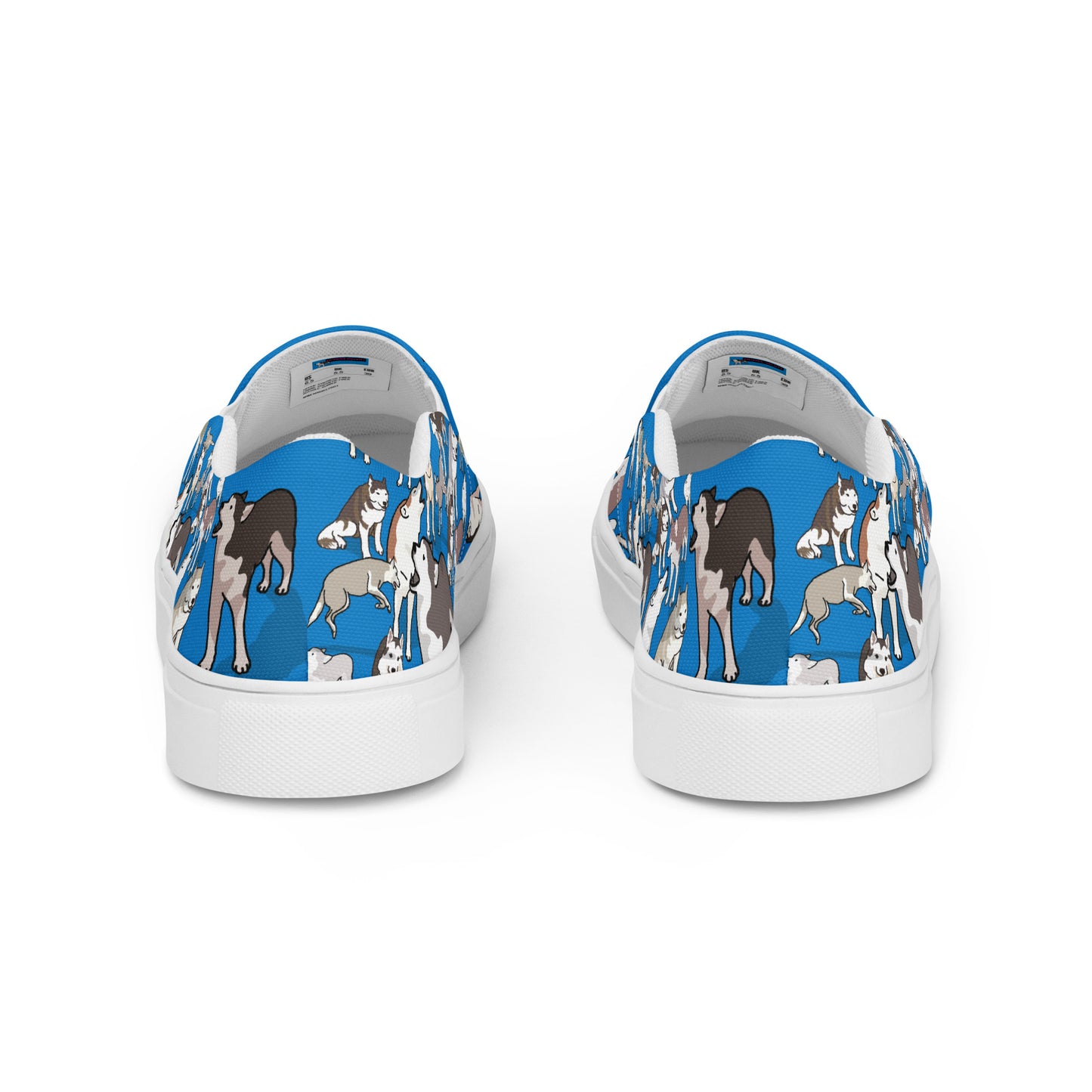 White men's slip-on canvas shoes from Eccentric Chemistry's Polar Pup Velocity Study Experiment collection, showing back view.