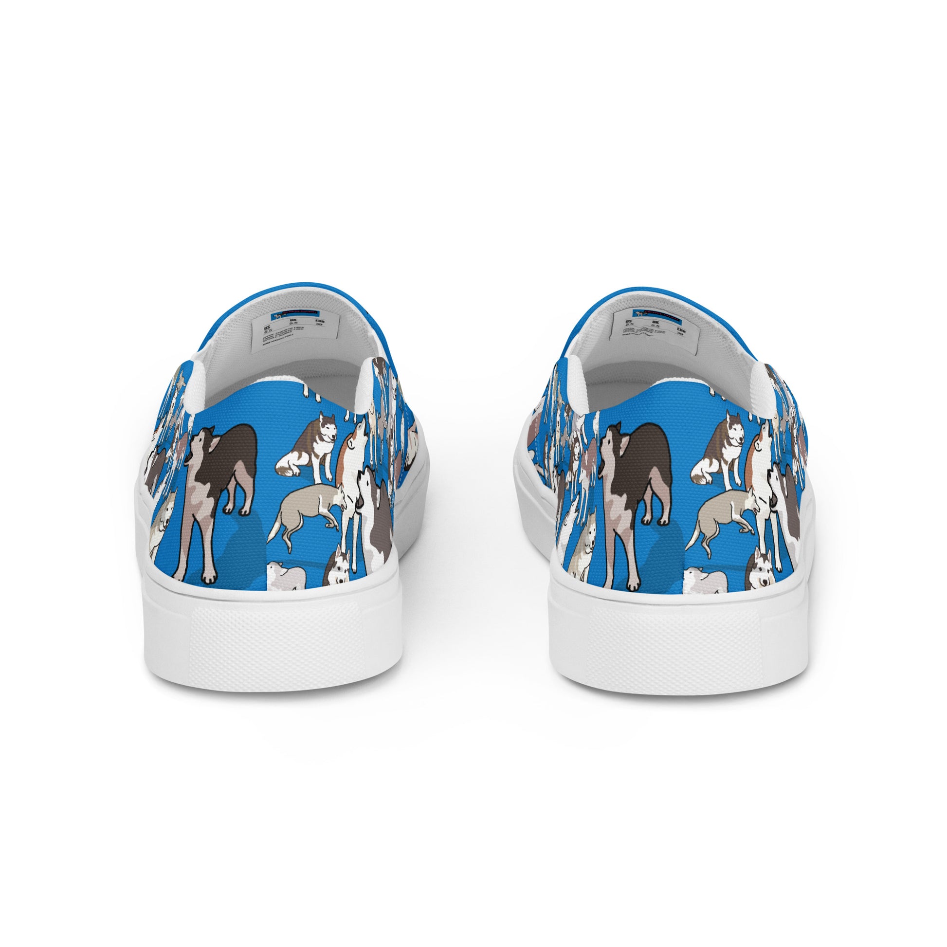 White men's slip-on canvas shoes from Eccentric Chemistry's Polar Pup Velocity Study Experiment collection, showing back view.