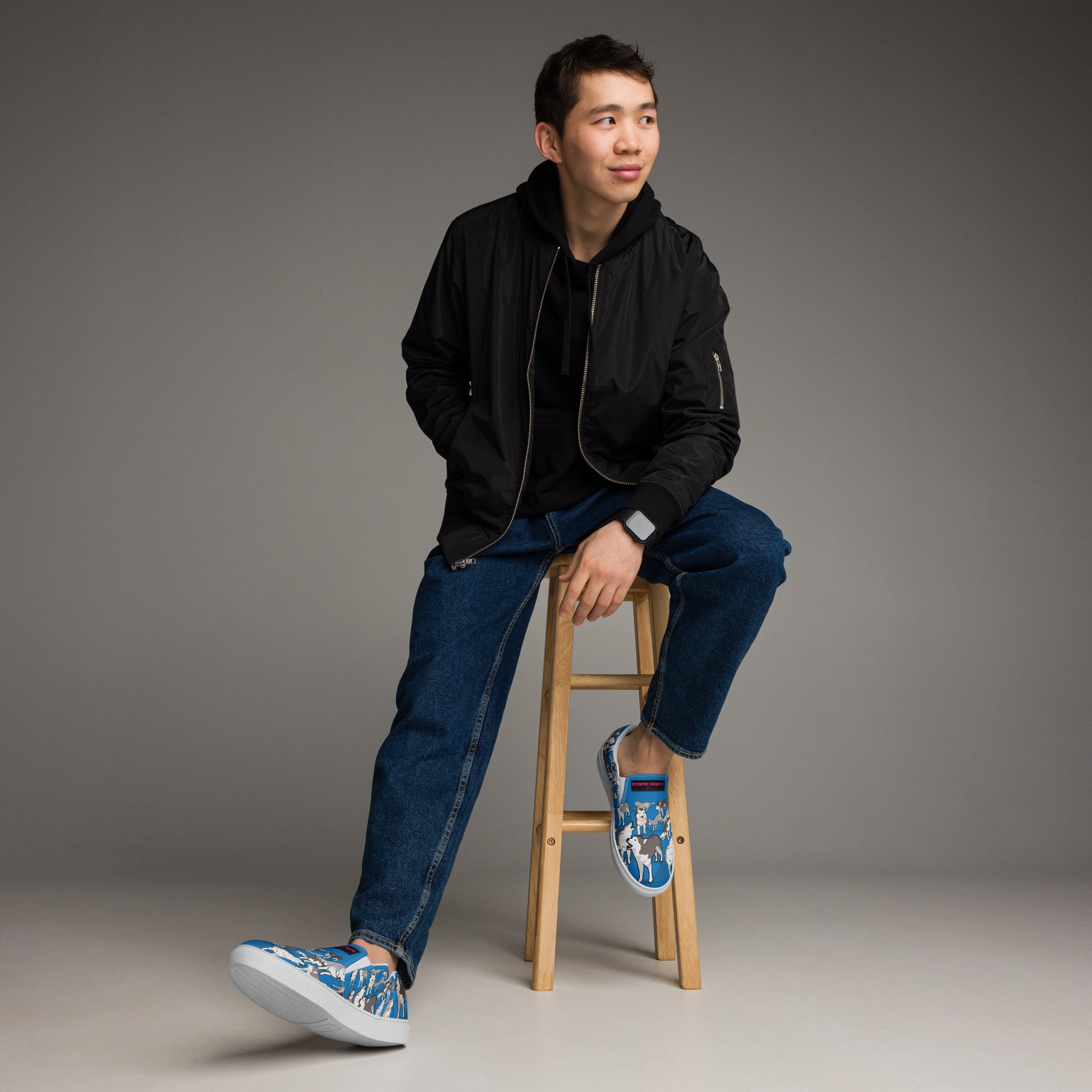 Men’s white slip-on canvas shoes by Eccentric Chemistry’s Laboratory of Strange & Stylish Things, featuring a sleek front view.