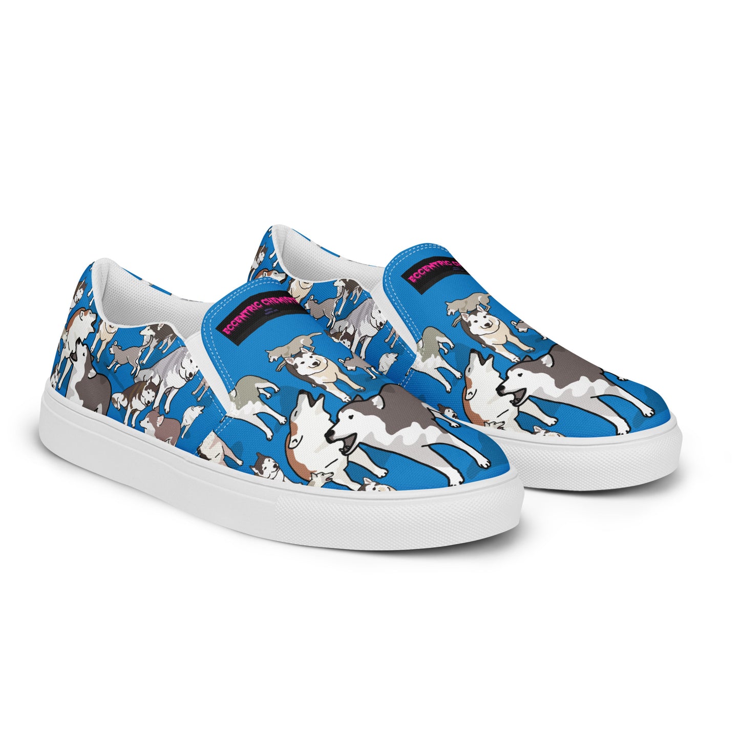 Men’s white slip-on canvas shoes by Eccentric Chemistry with a sleek design, shown from the front right side.