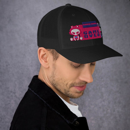 Black pixel panic experiment trucker cap with mesh back and flat brim, featuring a retro-inspired design from Eccentric Chemistry.
