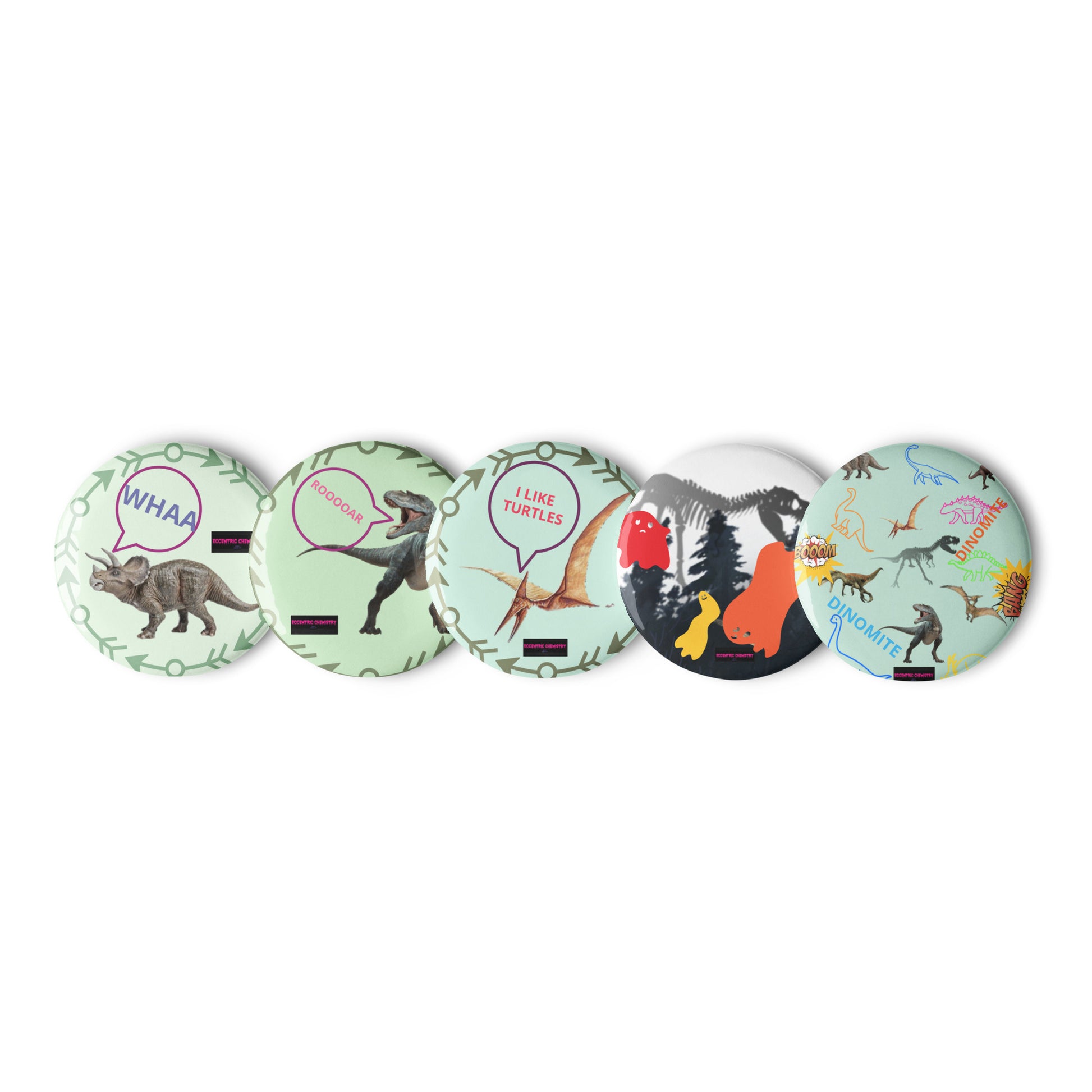 Set of prehistoric poison-spit cutie pin buttons by Eccentric Chemistry with white backgrounds and detailed front designs.