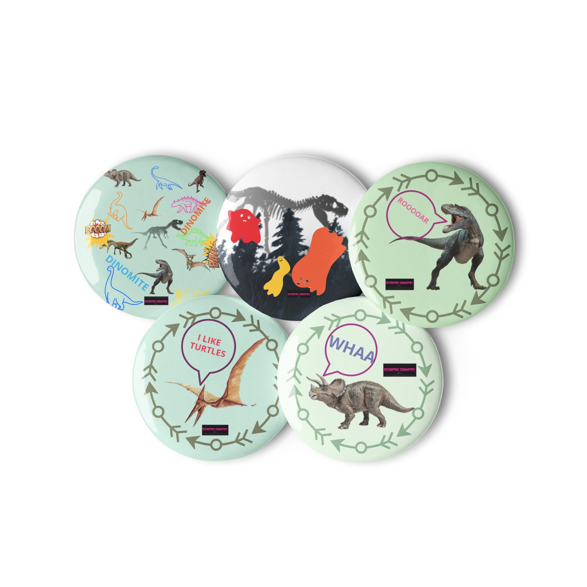 Set of prehistoric poison-spit cutie experiment pin buttons featuring colorful cartoon-style illustrations, designed by Eccentric Chemistry.