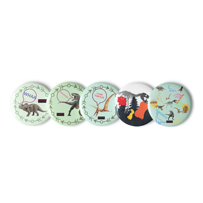 Set of prehistoric poison-spit cutie pin buttons from Eccentric Chemistry's Tiny Shop of T-Shirt Horrors, featuring colorful, detailed designs.