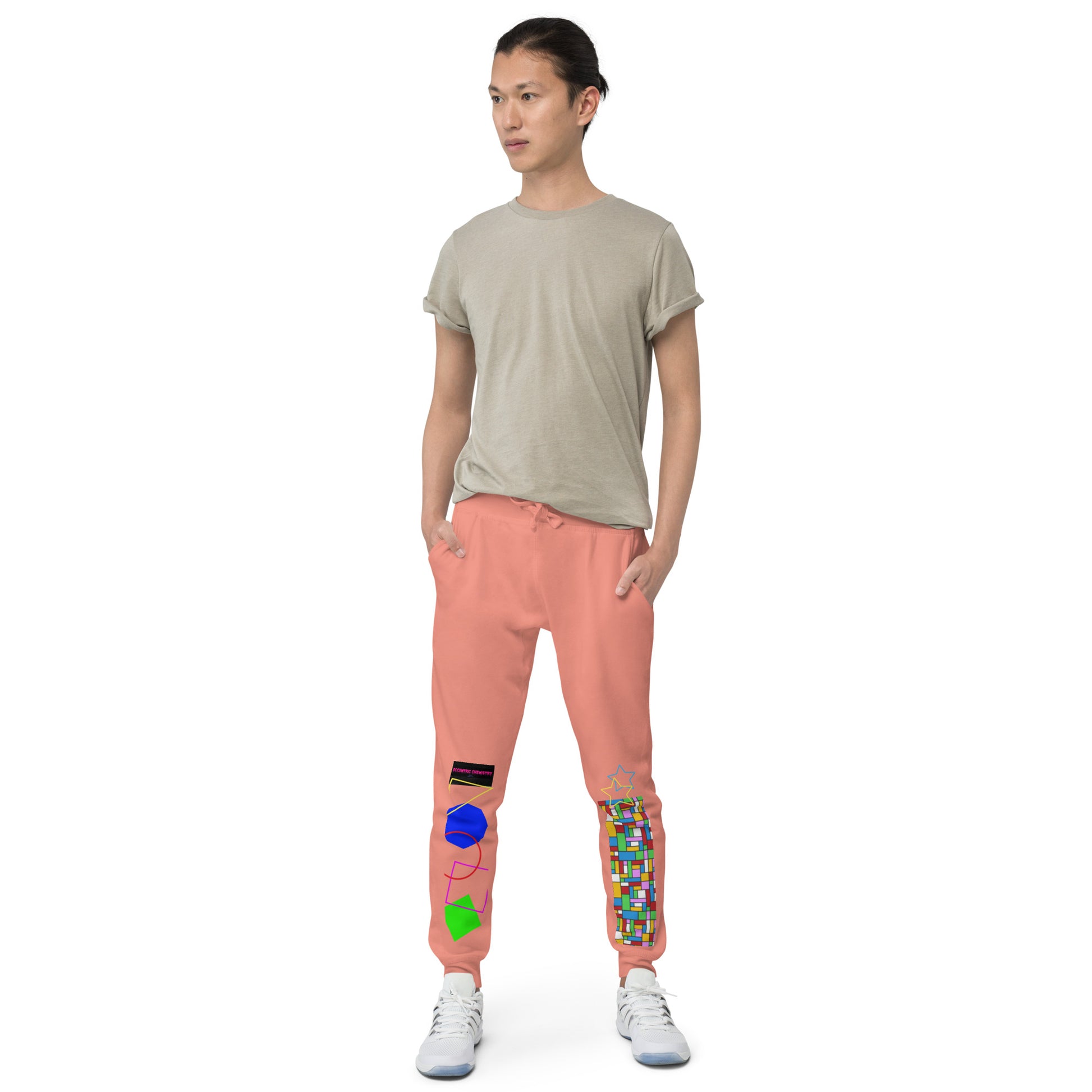 Unisex dusty rose fleece sweatpants with geometric patterns, front view, casual joggers by Eccentric Chemistry's Tiny Shop of T-Shirt Horrors.
