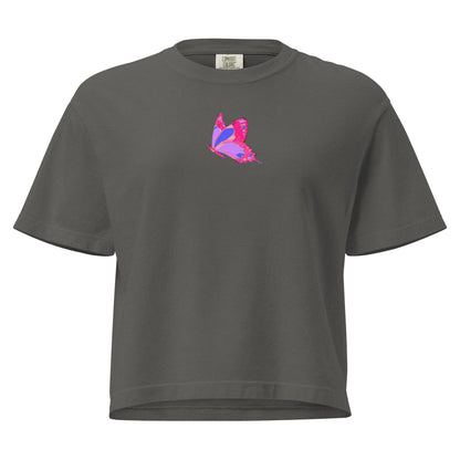 Women’s heavyweight boxy T-shirt from Eccentric Chemistry with winged serenity design, featuring a front view in pepper color.