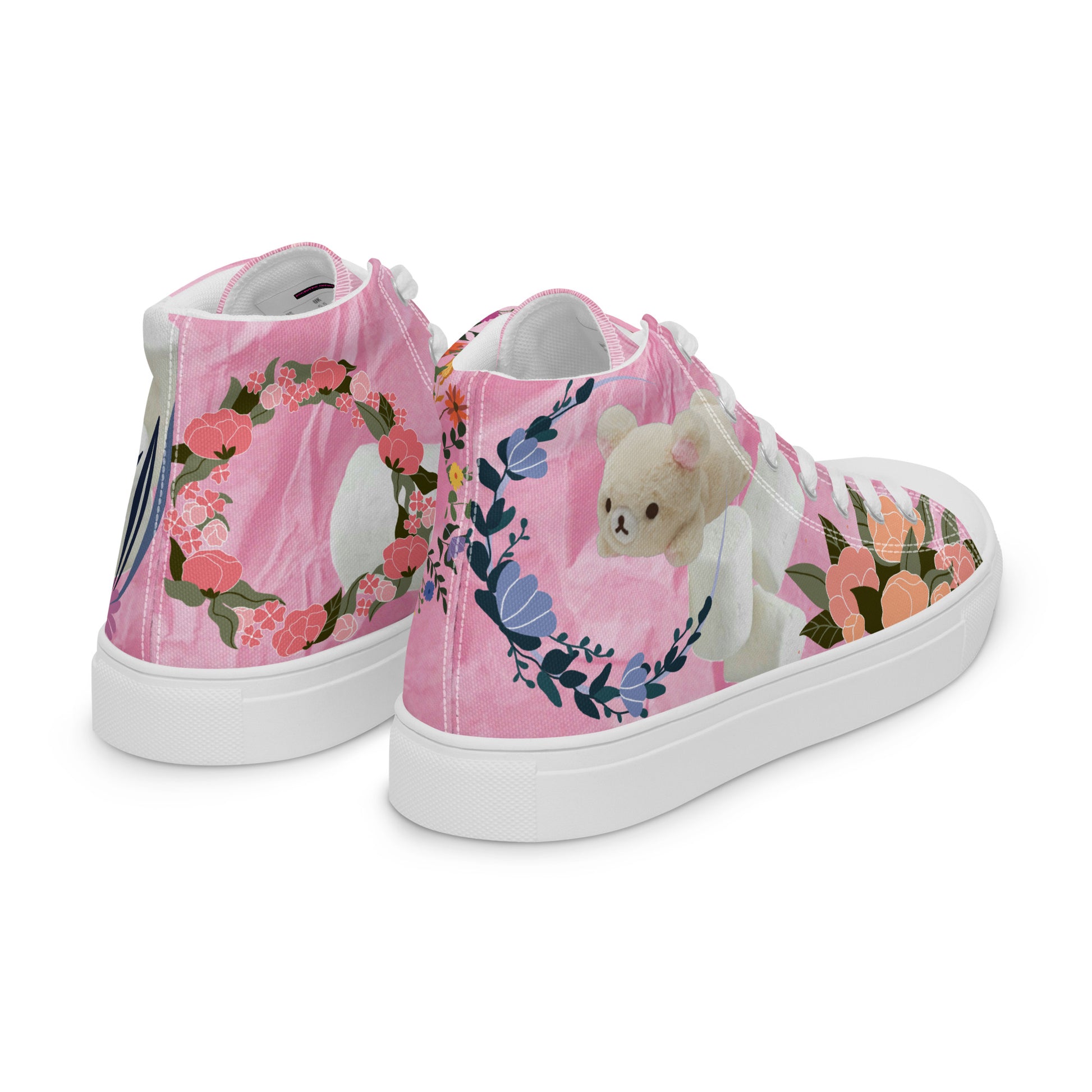 Women's high-top canvas shoes in white with pink accents, featuring marshmallow friends design and colorful Joy Experiment details.